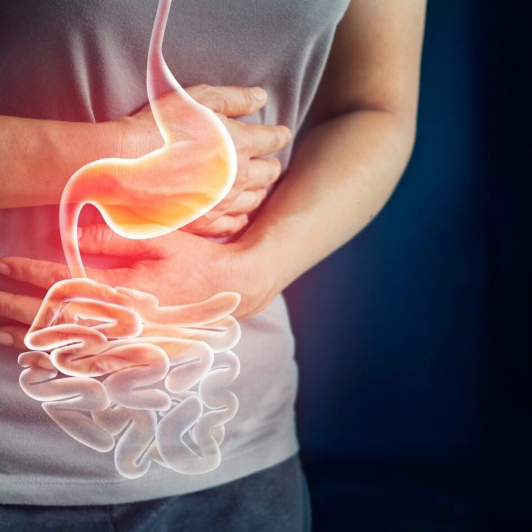 Woman touching stomach painful suffering from stomachache causes of menstruation period, gastric ulcer, appendicitis or gastrointestinal system desease. Healthcare and health insurance concept